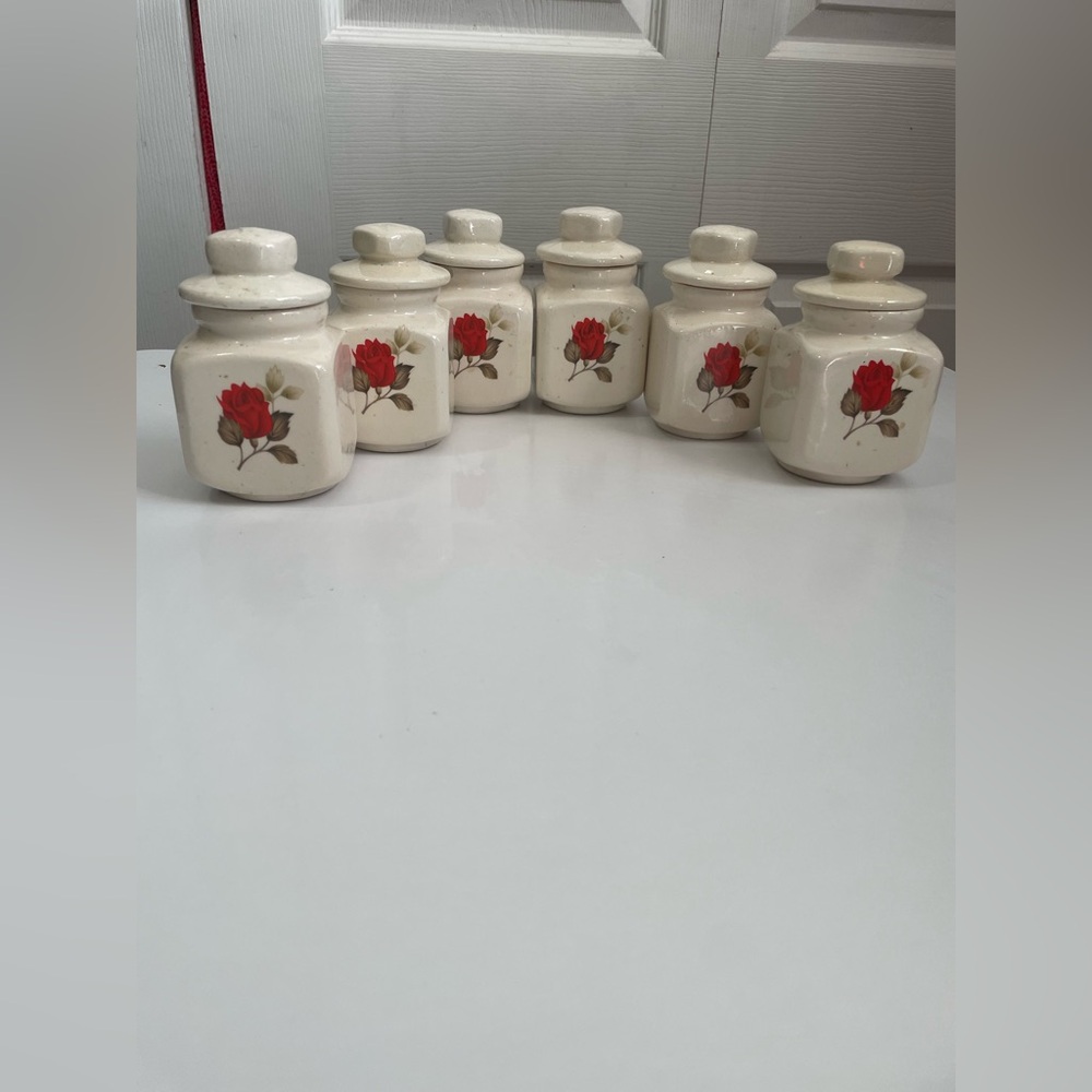 6 glass jars with tops